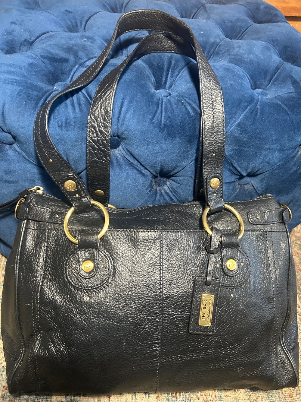 The Sak Black Leather Shoulder Tote with Gold Accents